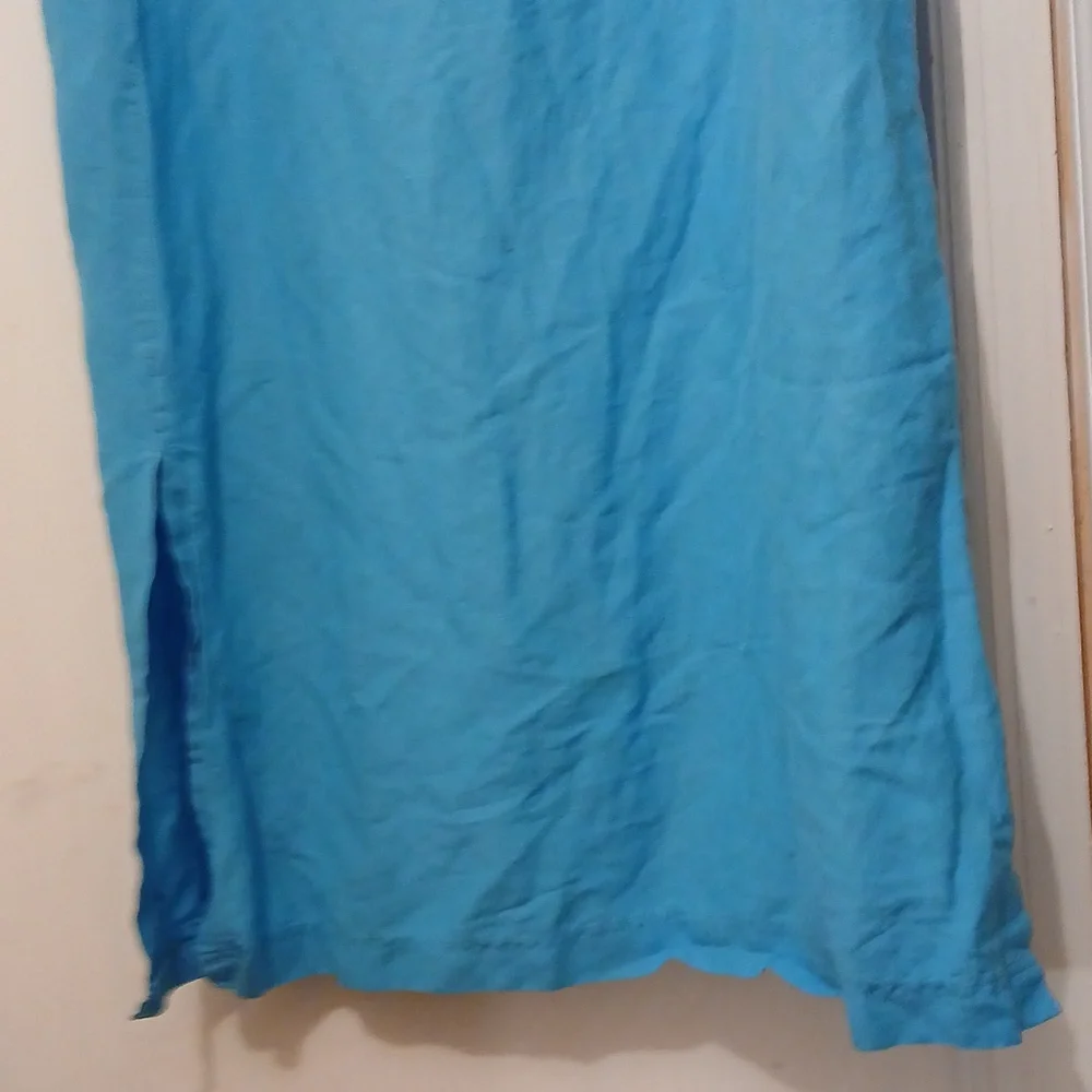 Aqua light blue skirt with pockets in the front and a split on the side - Picture 5 of 5